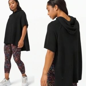 black Lululemon Opened Up Poncho made from a knit blend